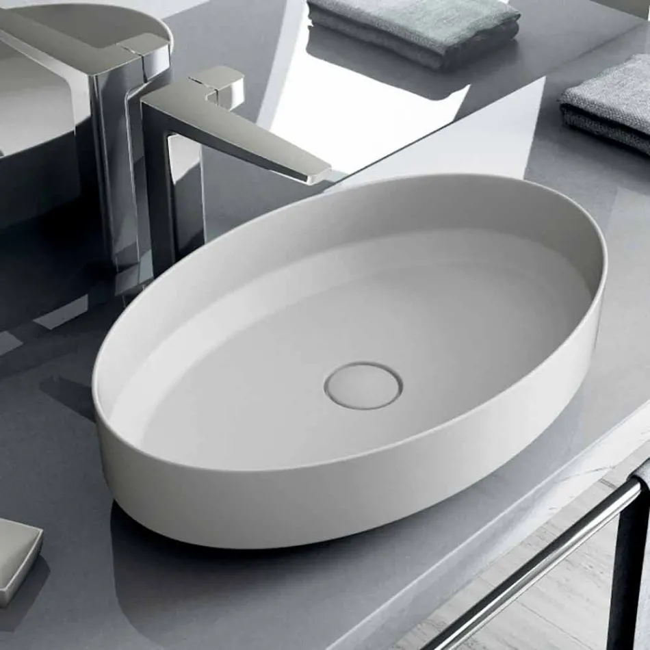 Oval ceramic counter top washbasin made in Italy, Yoel Viadurini