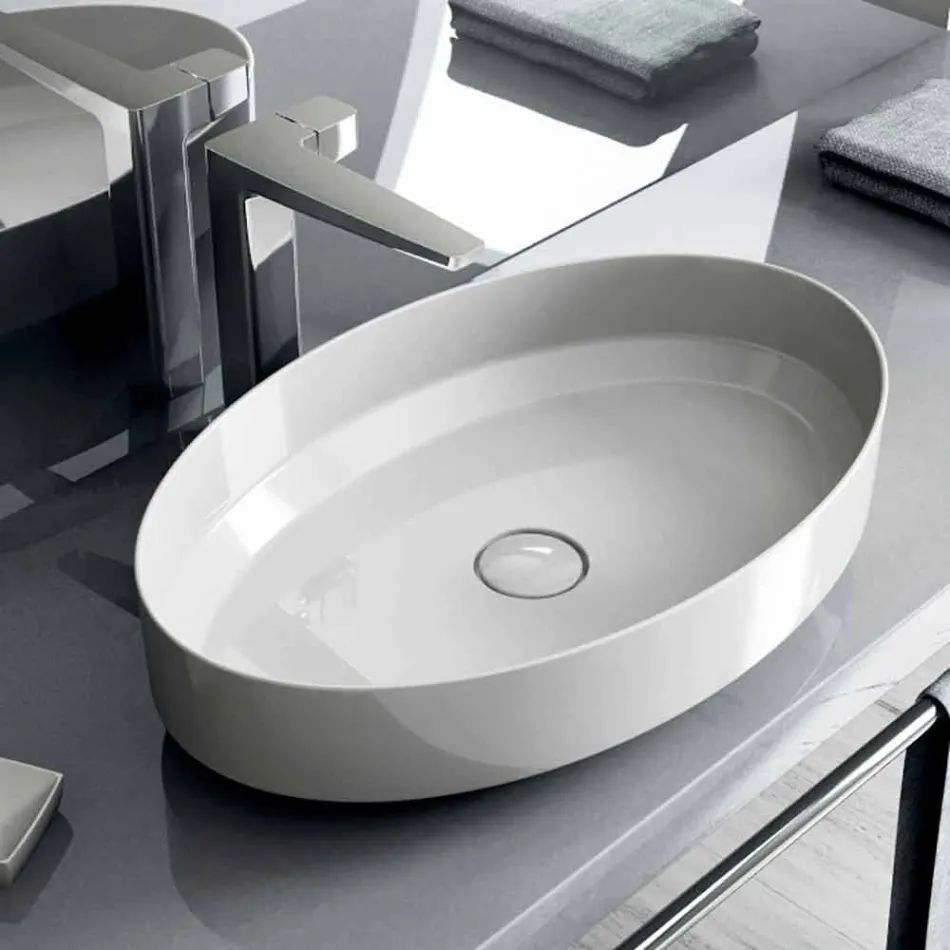 Oval ceramic counter top washbasin made in Italy, Yoel Viadurini