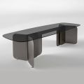 Table with shaped glass top and curved metal base - Piacere